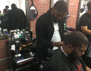 Philly-based barber B. Jawuan Jones wanted to give back to the community by giving free haircuts to homeless people. In 2017, he was gifted his own barber shop. Over the next five years, Jones hopes to open a homeless shelter. (Taylor Allen/WHYY News)