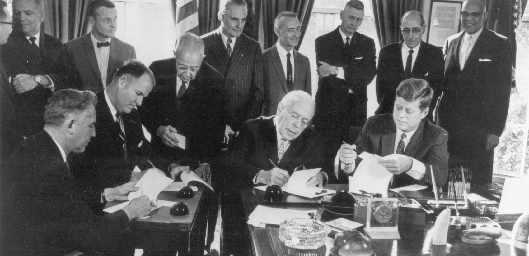 Governors Robert Meyner of New Jersey, Elbert Carvel of Delaware, and David Lawrence of Pennsylvania joined President John F. Kennedy at the White House on November 2, 1961, to participate in a ceremonial signing of the Delaware River Basin Compact. (DRBC)