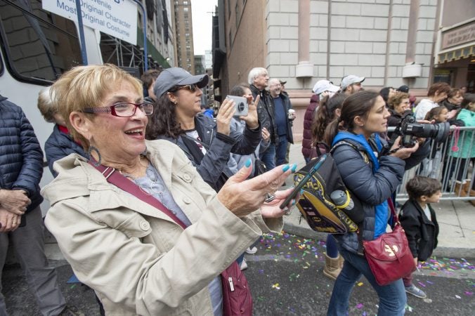 Mummers slow-strut Philly's New Year's tradition in spring weather - WHYY