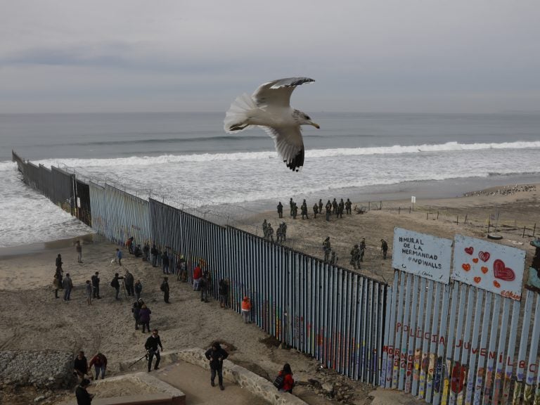 The westernmost edge of the U.S. border wall separates Tijuana from San Diego. Most undocumented immigrants in this country did not enter the U.S. at the Southern border. (Rebecca Blackwell/AP)