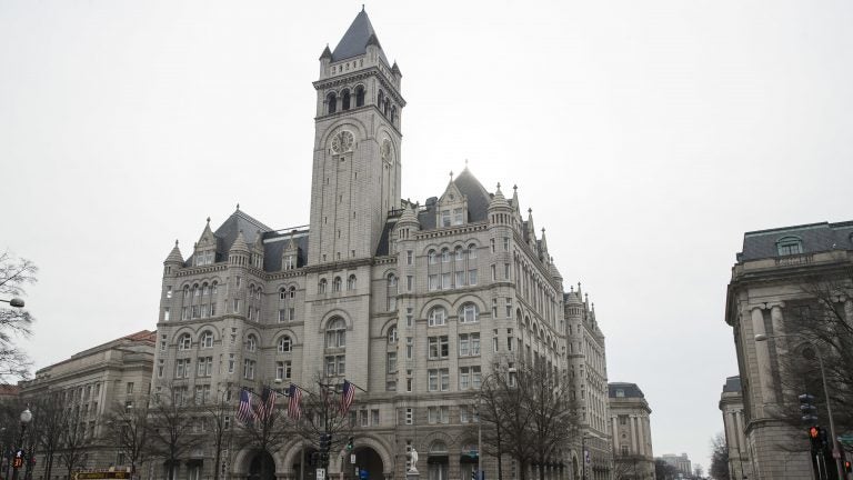 The Old Post Office Pavilion Clock Tower, which remains open during the partial government shutdown, is seen above the Trump International Hotel in Washington. (Alex Brandon/AP)