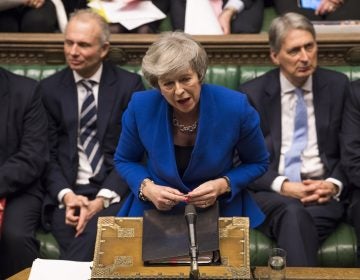 British Prime Minister Theresa May speaks Wednesday at the House of Commons in London during a debate before a no-confidence vote raised by opposition Labour Party leader Jeremy Corbyn. May withstood the challenge to her leadership. Britain's Prime Minister Theresa May speaks during a debate before a no-confidence vote on Theresa May raised by opposition Labour Party leader Jeremy Corbyn, in the House of Commons in London on Wednesday. (Mark Duffy/AP)