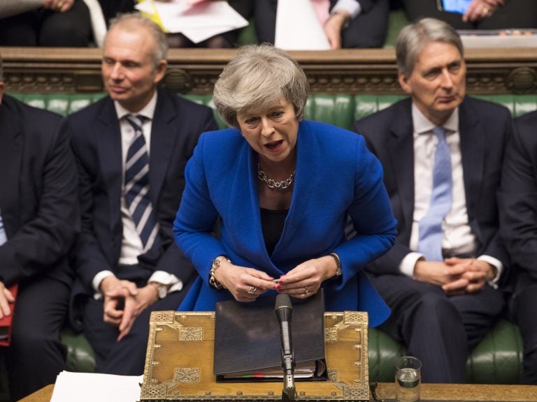 British Prime Minister Theresa May speaks Wednesday at the House of Commons in London during a debate before a no-confidence vote raised by opposition Labour Party leader Jeremy Corbyn. May withstood the challenge to her leadership. Britain's Prime Minister Theresa May speaks during a debate before a no-confidence vote on Theresa May raised by opposition Labour Party leader Jeremy Corbyn, in the House of Commons in London on Wednesday. (Mark Duffy/AP)