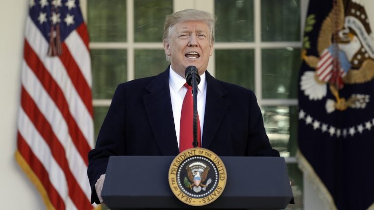 President Trump speaks in the Rose Garden of the White House on Friday, saying he will endorse a short-term spending deal to end the government shutdown. (Evan Vucci/AP)