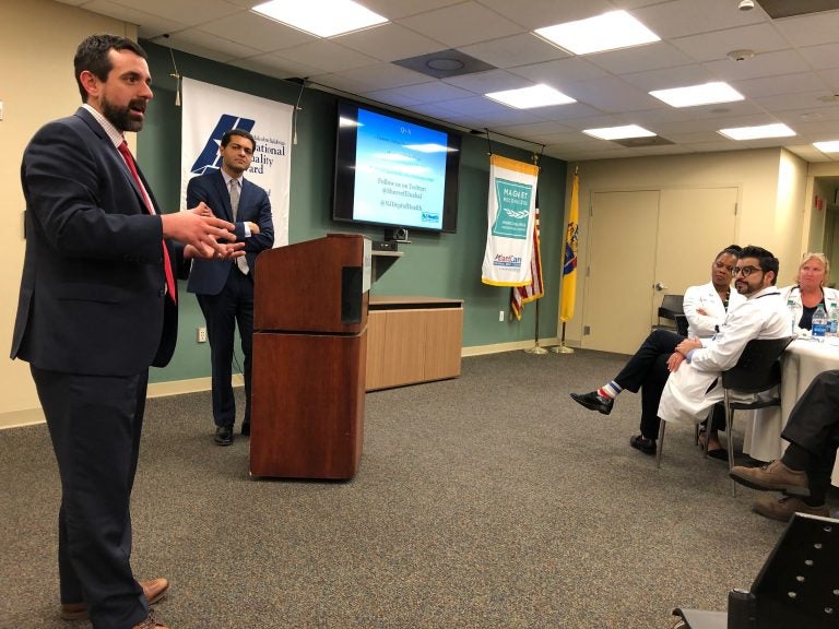 Assistant New Jersey Health Commissioner Jeff Brown and Commissioner Shereef Elnahal extol the benefits of medical marijuana at a gathering Wednesday in Atlantic City. (Joe Hernandez/WHYY)