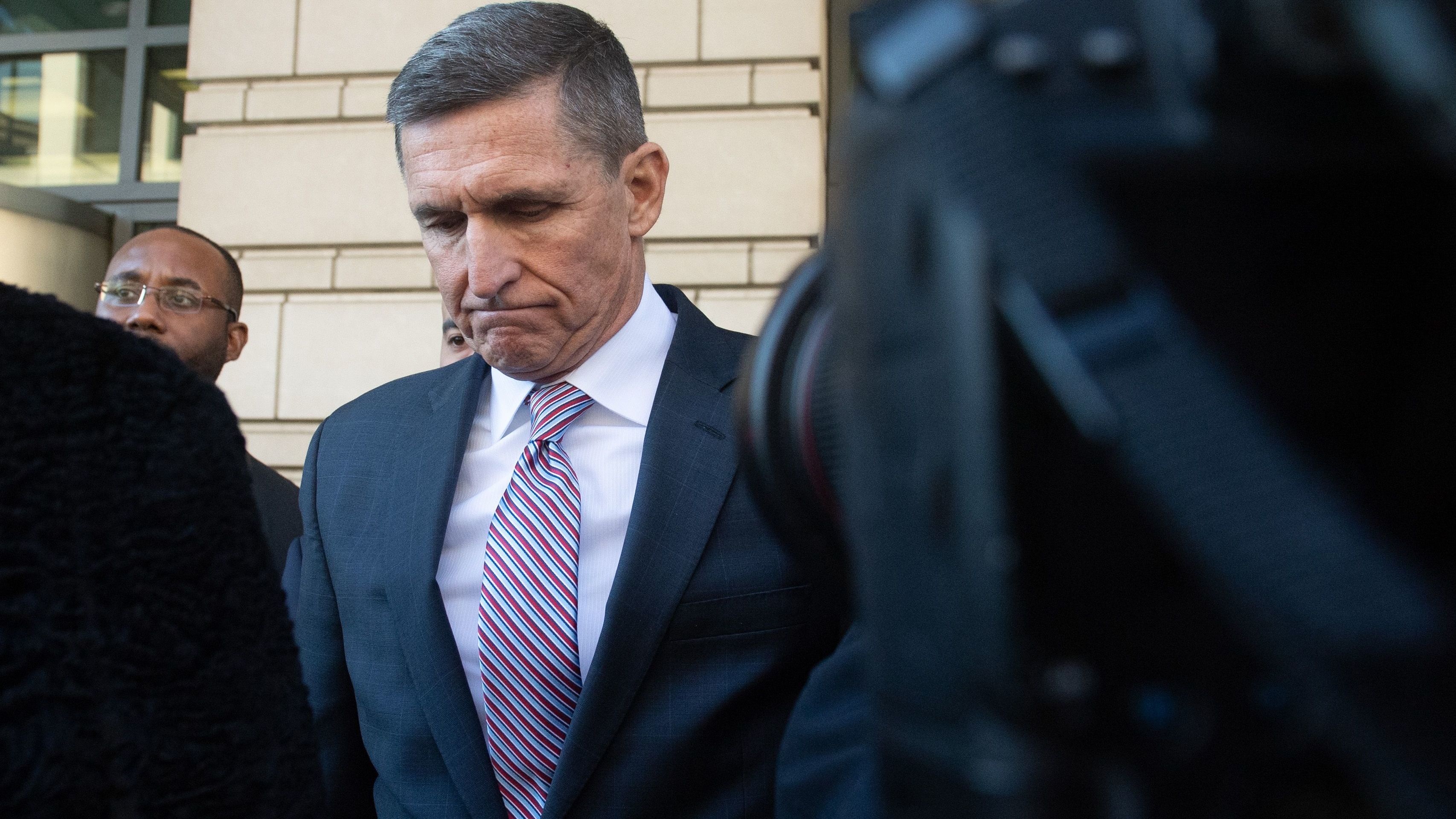 Former national security adviser Michael Flynn leaves after the delay in his sentencing hearing at U.S. District Court in Washington, D.C, on December 18, 2018.