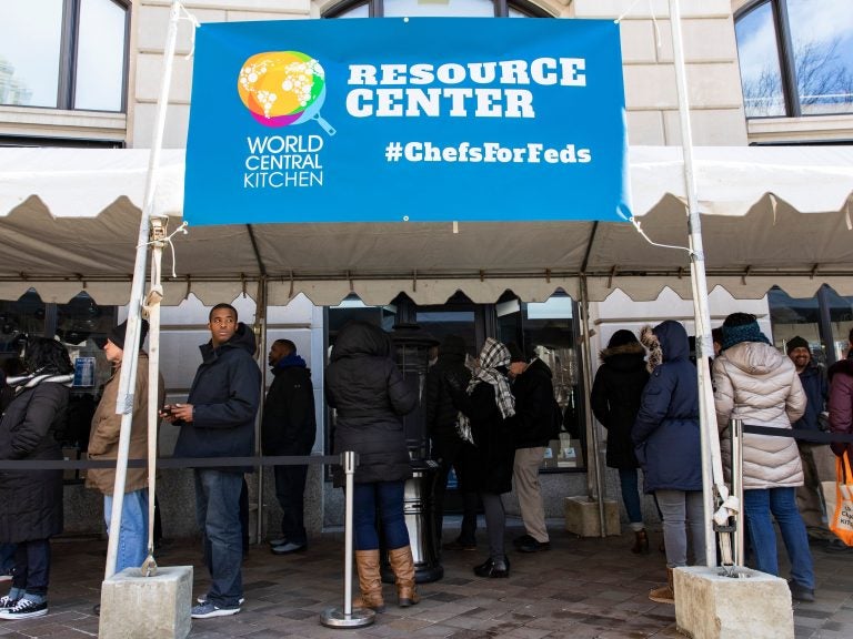 Federal employees wait in line at World Central Kitchen, a food bank and food distribution center established by celebrity chef José Andrés. The federal government is back open, but it could be several days before workers receive missed paychecks. Federal employees wait in line at World Central Kitchen, a food bank and food distribution center established by celebrity chef José Andrés. The federal government is back open, but it could be several days before workers receive missed paycheck