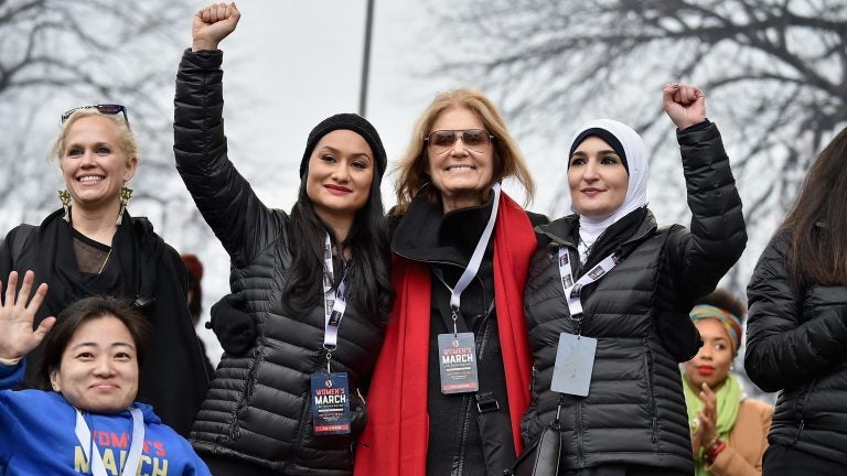 Ginny Suss, Carmen Perez, Gloria Steinem, Linda Sarsour and Mia Ives-Rublee appear at the first Women's March in Washington, D.C., the day after President Trump's 2017 inauguration. Two years later, divisions in the movement have dampened the 2019 events. (Theo Wargo/Getty Images)