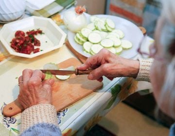 Even something as simple as chopping up food on a regular basis can be enough exercise to help protect older people from showing signs of dementia, a new study suggests. (BSIP/UIG/Getty Images)