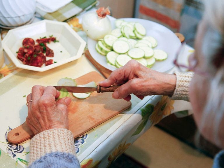 Even something as simple as chopping up food on a regular basis can be enough exercise to help protect older people from showing signs of dementia, a new study suggests. (BSIP/UIG/Getty Images)