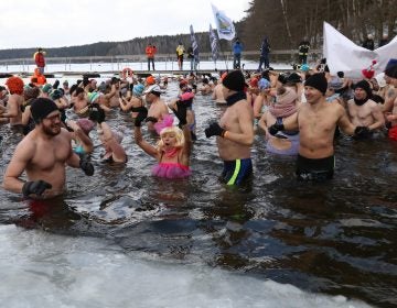 Winter swimmers enjoyed an icy dip in Poland's Garczyn lake last February. Recorded air temperature was around 14 degrees Farenheit, and a large ice hole had to be cut to allow the lake bathing