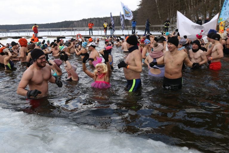 Winter swimmers enjoyed an icy dip in Poland's Garczyn lake last February. Recorded air temperature was around 14 degrees Farenheit, and a large ice hole had to be cut to allow the lake bathing