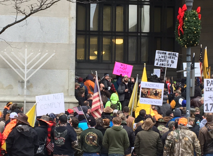 Demonstrators take part in a pro-gun rights rally outside of the City-County Building in downtown Pittsburgh. (Lucy Perkins/90.5 WESA)