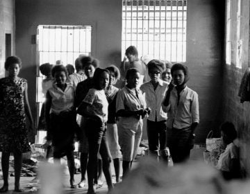 In August 1963, African-American girls were held in a Georgia stockade after being arrested for demonstrating segregation. Left to right: Melinda Jones Williams (13), Laura Ruff Saunders (13), Mattie Crittenden Reese, Pearl Brown, Carol Barner Seay (12), Annie Ragin Laster (14), Willie Smith Davis (15), Shirley Green (14), and Billie Jo Thornton Allen (13). Sitting on the floor: Verna Hollis (15). (Danny Lyon)