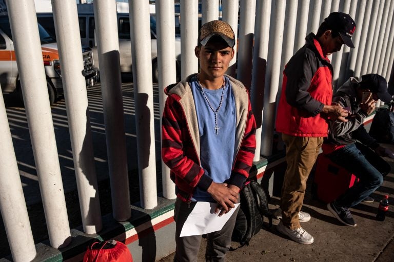 Darling Adalid Mercado, 19 (center), left his home in Ocotepeque, Honduras, three months ago to flee town thugs who wanted to recruit him. (Guillermo Arias for NPR)