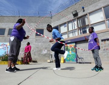 Taryn Mitchell playing with her daughter at Folsom Women's Facility in Folsom Calif. (AP Photo/Rich Pedroncelli)