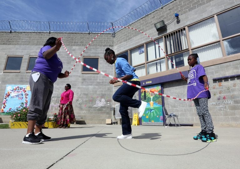 Taryn Mitchell playing with her daughter at Folsom Women's Facility in Folsom Calif. (AP Photo/Rich Pedroncelli)
