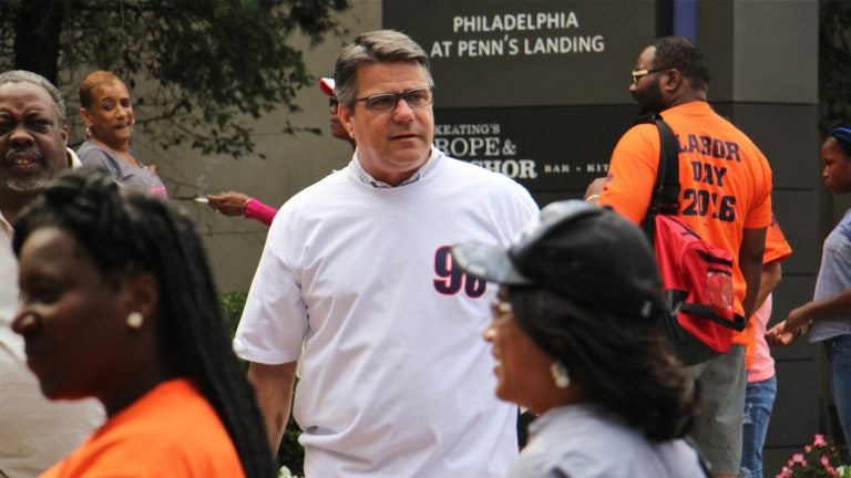 Philadelphia City Councilman Bobby Henon wears a Local 98 T-shirt at the Labor Day parade. Henon's office at City Council was searched by the FBI a month before. (Emma Lee/WHYY)