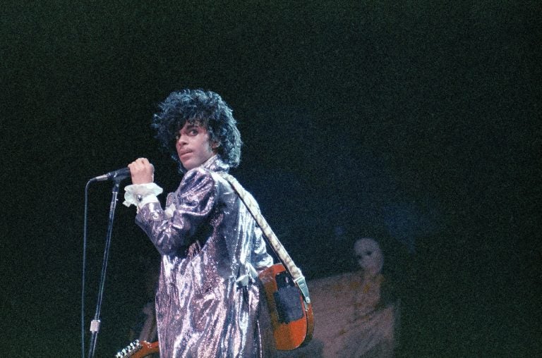 Singer Prince is shown in concert in 1985.  (AP Photo)