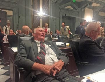 State Rep. Dave Wilson has eyes closed, appears to be sleeping in a late-night legislative session.