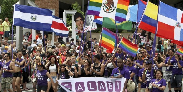 In this 2014 photo, people march in the annual Pride Day Parade in Philadelphia.
(Joseph Kaczmarek/AP Photo)