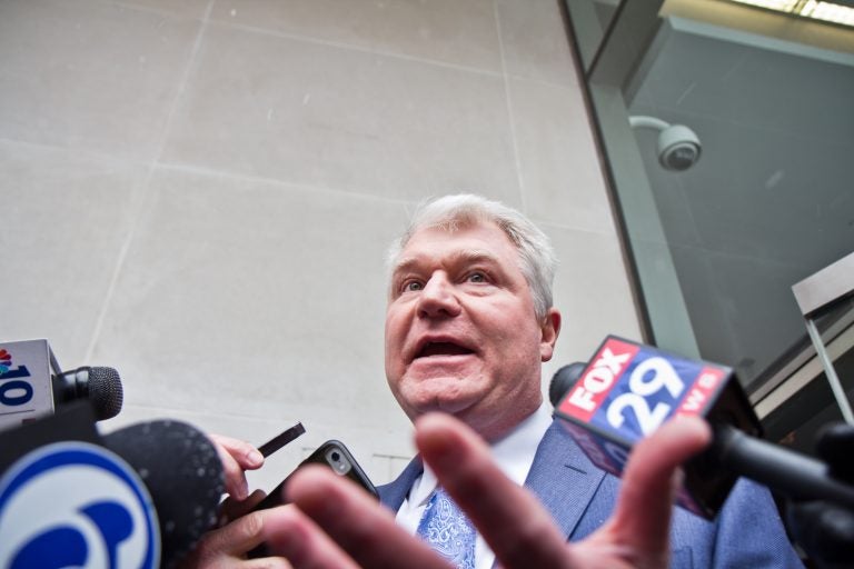 Union Leader John Dougherty exits federal court after he pleaded not guilty at his arraignment Friday afternoon. (Kimberly Paynter/WHYY)