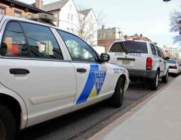 New Jersey State Police cars parked on West State Street, Trenton, outside the capitol complex. (Emma Lee/WHYY)