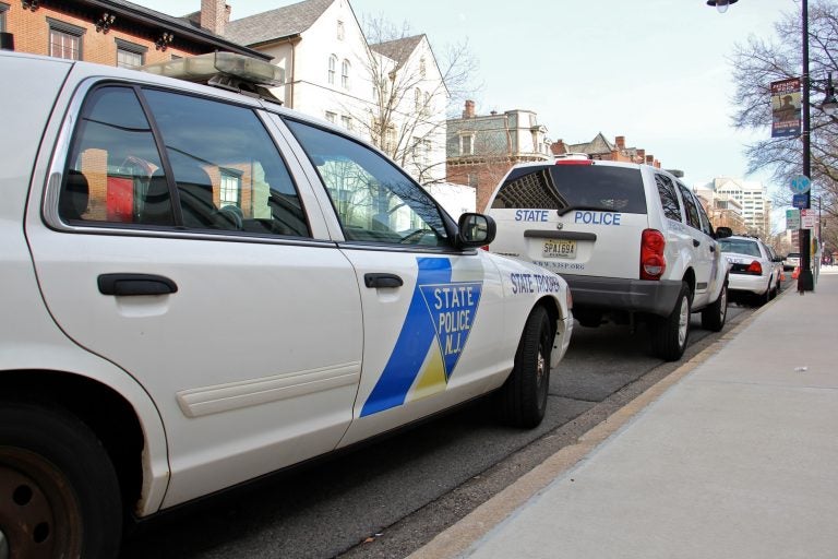 New Jersey State Police cars parked on West State Street, Trenton, outside the capitol complex. (Emma Lee/WHYY)