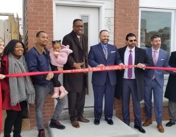 City Council President Darrell Clarke (center) at a ribbon cutting event. (Tom MacDonald/WHYY)