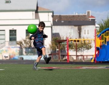Andres Hassan, 7, plays in the yard of the Sanchez Elementary School in San Francisco, Calif. (Lisa Hornak/For WHYY)