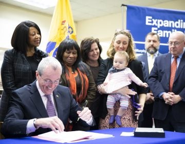 Governor Phil Murphy signs sweeping legislation to expand paid family leave on February 19, 2019, in Piscataway. (Edwin J. Torres/Governor's Office)