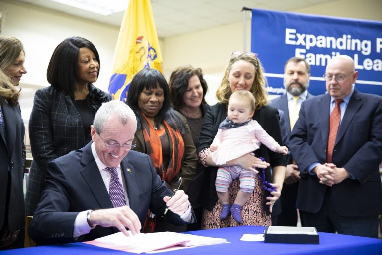 Governor Phil Murphy signs sweeping legislation to expand paid family leave on February 19, 2019, in Piscataway. (Edwin J. Torres/Governor's Office)