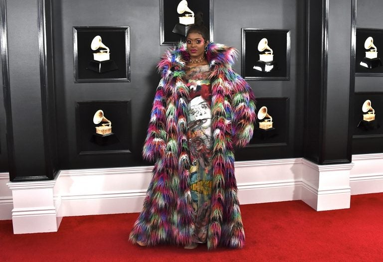 Tierra Whack arrives at the 61st annual Grammy Awards at the Staples Center in Los Angeles last Sunday. She's wearing a coat designed by Nancy Volpe Beringer of Philadelphia and a dress with images painted by Liz Goldberg, a Philadelphia artist. (Photo by Jordan Strauss/Invision/AP)