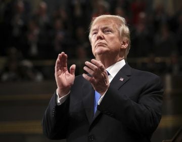 President Donald Trump claps during the State of the Union address in the House chamber of the U.S. Capitol to a joint session of Congress Tuesday, Jan. 30, 2018 in Washington. (Win McNamee/Pool via AP)