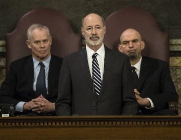 Democratic Gov. Tom Wolf delivers his budget address for the 2019-20 fiscal year to a joint session of the Pennsylvania House and Senate in Harrisburg, Pa., Tuesday, Feb. 5, 2019. House Speaker Mike Turzai, R-Allegheny, and Lt. Gov. John Fetterman is at right. (Matt Rourke/AP Photo)