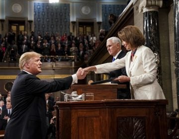 President Donald Trump shakes hands with House Speaker Nancy Pelosi as Vice President Mike Pence looks on, as he arrives in the House chamber before giving his State of the Union address to a joint session of Congress, Tuesday, Feb. 5, 2019 at the Capitol in Washington. (Doug Mills/The New York Times via AP, Pool)