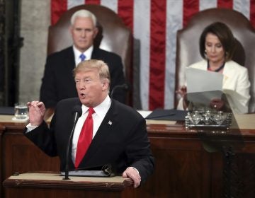 President Donald Trump delivers his State of the Union address to a joint session of Congress on Capitol Hill in Washington, as Vice President Mike Pence listens and Speaker of the House Nancy Pelosi, D-Calif., reads the speech, Tuesday, Feb. 5, 2019. (Andrew Harnik/AP Photo)
