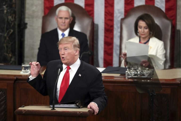 President Donald Trump delivers his State of the Union address to a joint session of Congress on Capitol Hill in Washington, as Vice President Mike Pence listens and Speaker of the House Nancy Pelosi, D-Calif., reads the speech, Tuesday, Feb. 5, 2019. (Andrew Harnik/AP Photo)