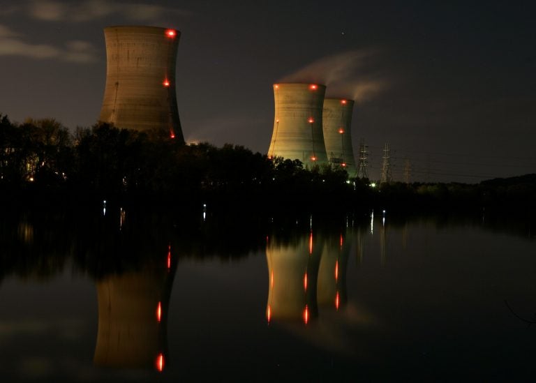 In this file photo from Nov. 2, 2006, cooling towers of the Three Mile Island nuclear power plant are reflected in the Susquehanna River in this time exposure photograph in Middletown, Pa. (Carolyn Kaster/AP Photo)