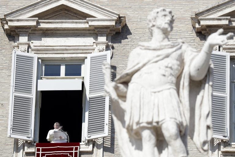 Pope Francis delivers his blessing during the Angelus noon prayer In St. Peter's Square at the Vatican, Sunday, Feb. 17, 2019. The pontiff is asking for prayers for this week's sex abuse summit at the Vatican, calling abuse an 