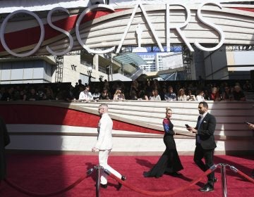 File photo: Media walk on the red carpet before the Oscars on Sunday, Feb. 24, 2019, at the Dolby Theatre in Los Angeles. (Photo by Jordan Strauss/Invision/AP)