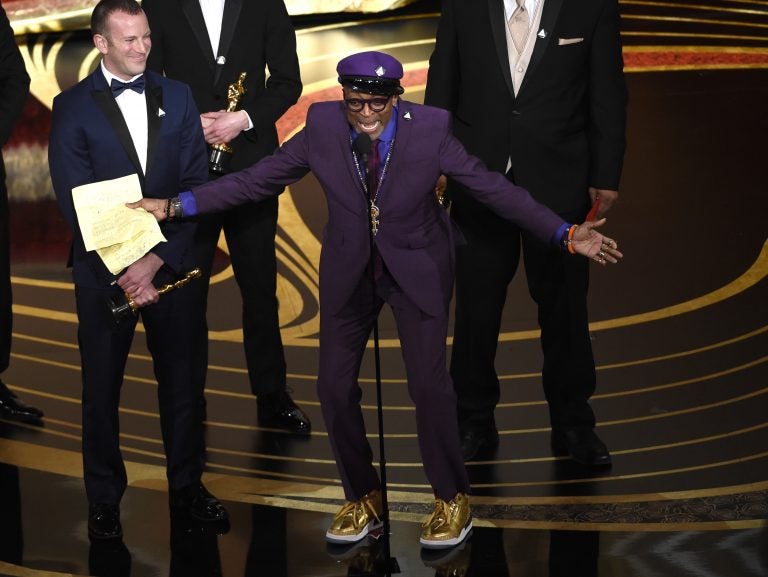 Charlie Wachtel, left, and Spike Lee accept the award for best adapted screenplay for 