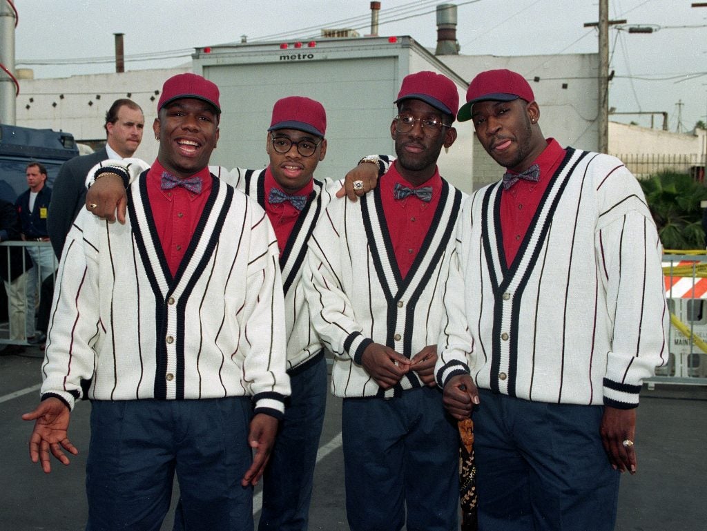 Boyz II Men members, from left, Wanya Morris, Nathan Vanderpool, Shawn Stockman and Mike McCary pose for a photo