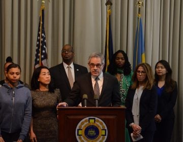 Philadelphia District Attorney Larry Krasner and supporters make an announcement on handling of juvenile criminal justice cases. (Tom MacDonald/WHYY)