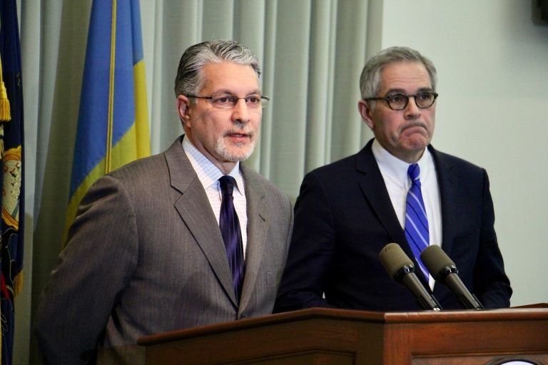 Anthony Voci (left) with District Attorney Larry Krasner