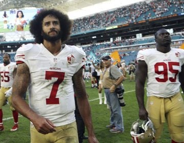 Former San Francisco 49ers quarterback Colin Kaepernick (7), shown here in 2016, has reached an agreement with the NFL over his allegations of collusion by teams. (Lynne Sladky/AP)