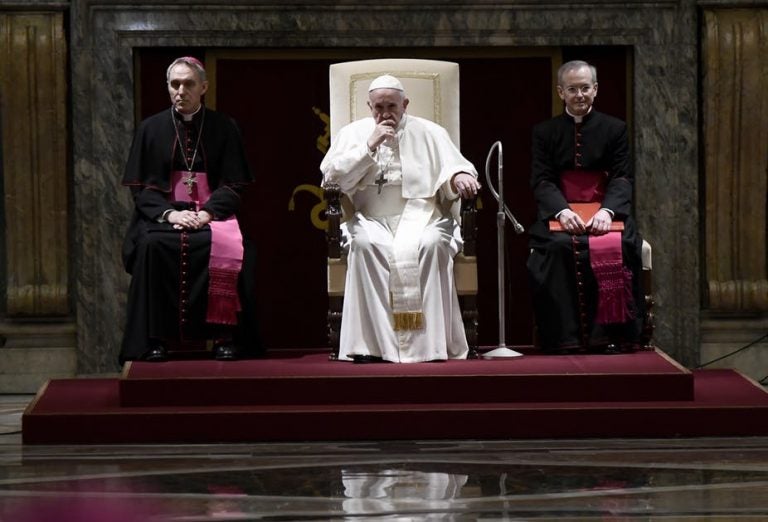 Pope Francis sits during the traditional greetings to the Roman Curia at the Vatican in December 2018. (Filippo Monteforte/Pool Photo via AP)