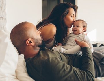 Protected time for new families could pay health dividends later. (Jacob Lund/Shutterstock)