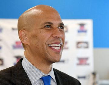 Sen. Cory Booker, D-N.J., visits Masterpiece Barber College as he campaigns for Nevada Democratic candidates in October 2018 in Las Vegas, Nev.