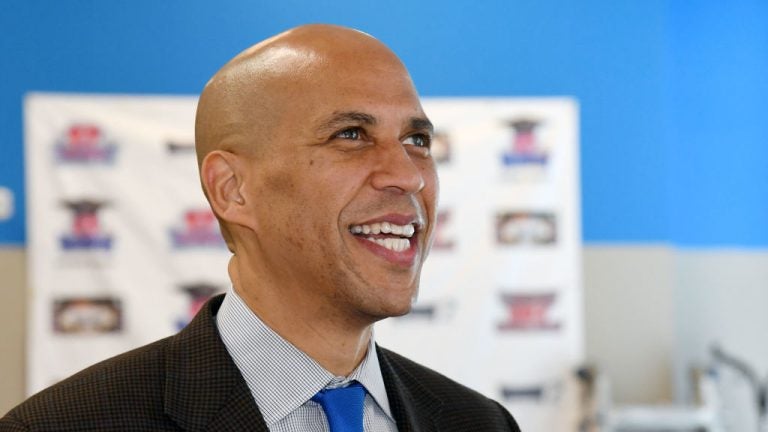 Sen. Cory Booker, D-N.J., visits Masterpiece Barber College as he campaigns for Nevada Democratic candidates in October 2018 in Las Vegas, Nev.